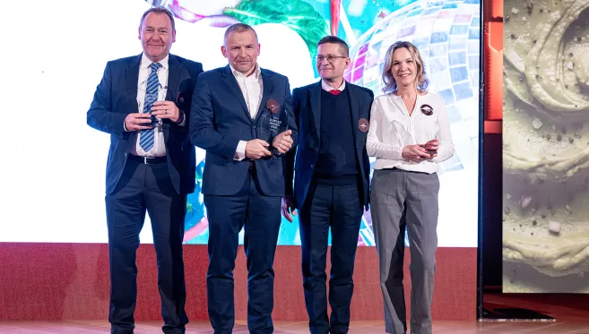 Coveris team receiving the Strive for Excellence award at the Paulig Supplier Forum 2026
